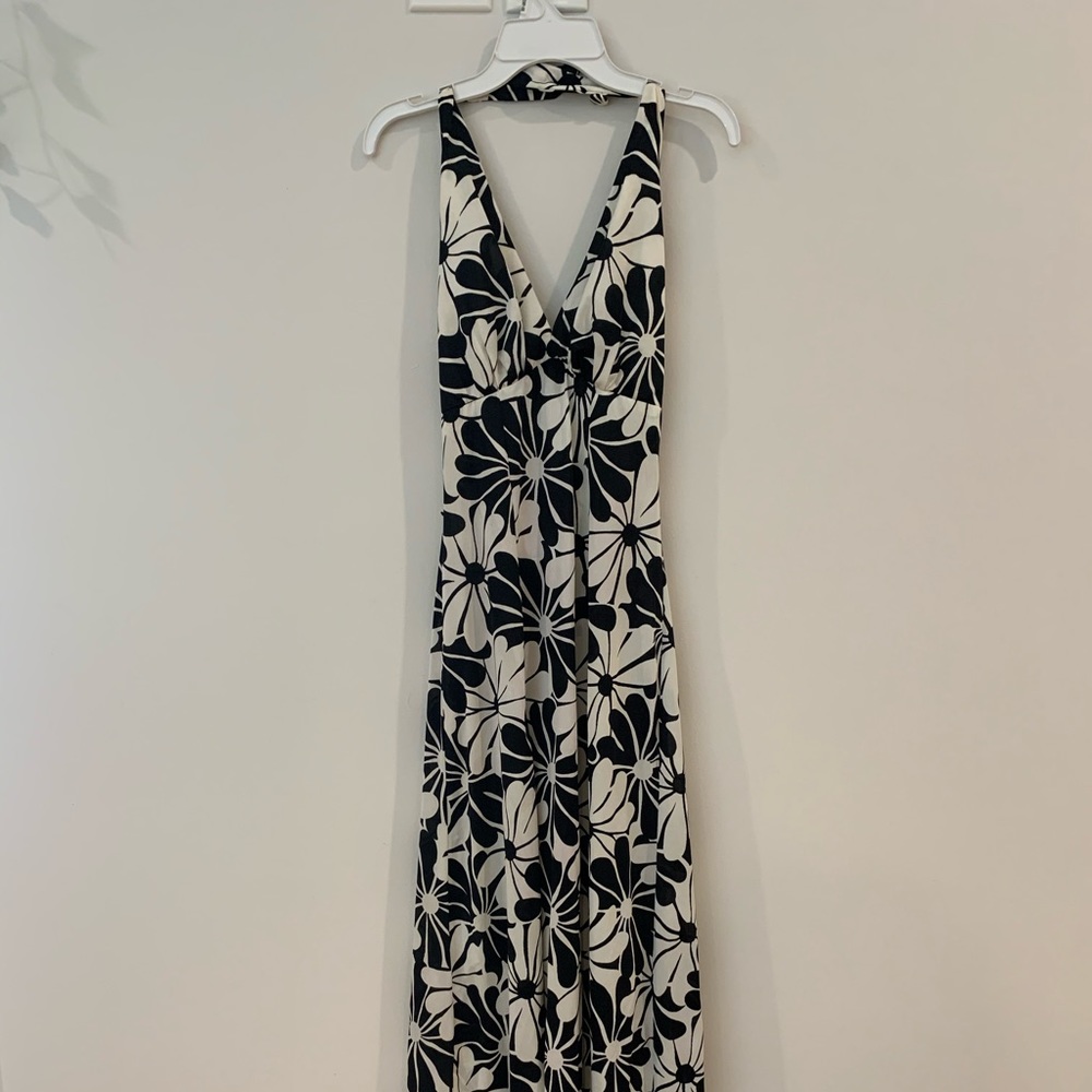 I couldn’t find a brand, but it is a great summer dress. Price negotiable